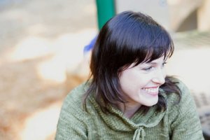 A woman smiles after going through drug detox for women